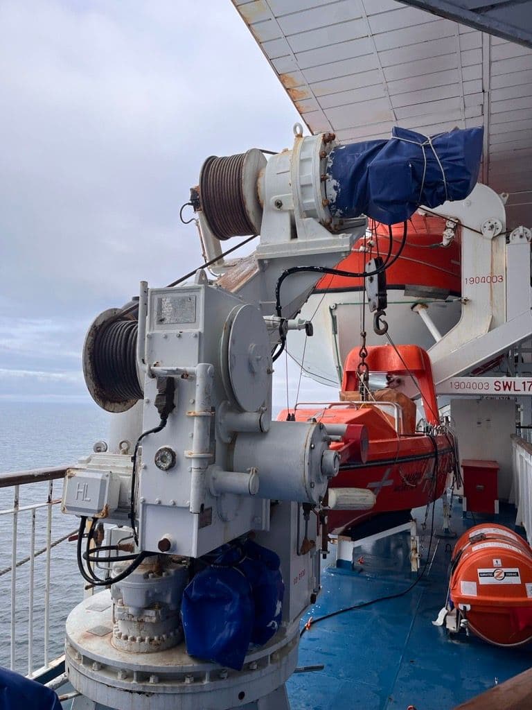 Rescue boat davit and winch on a ferry deck, kit that is rarely used but has to work when it is needed